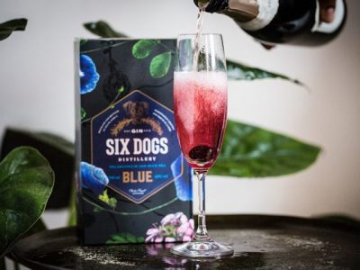 "Six Dogs Blue Gin bottle – Premium blue gin available online with fast delivery from The V Bar in Kenya."